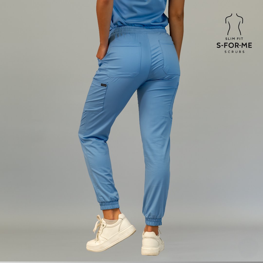 Women’s ceil blue scrub jogger pants back view with rear pockets and ankle cuffs