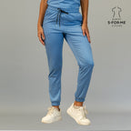 Front view of women’s ceil blue scrub jogger pants with drawstring waist and ankle cuffs