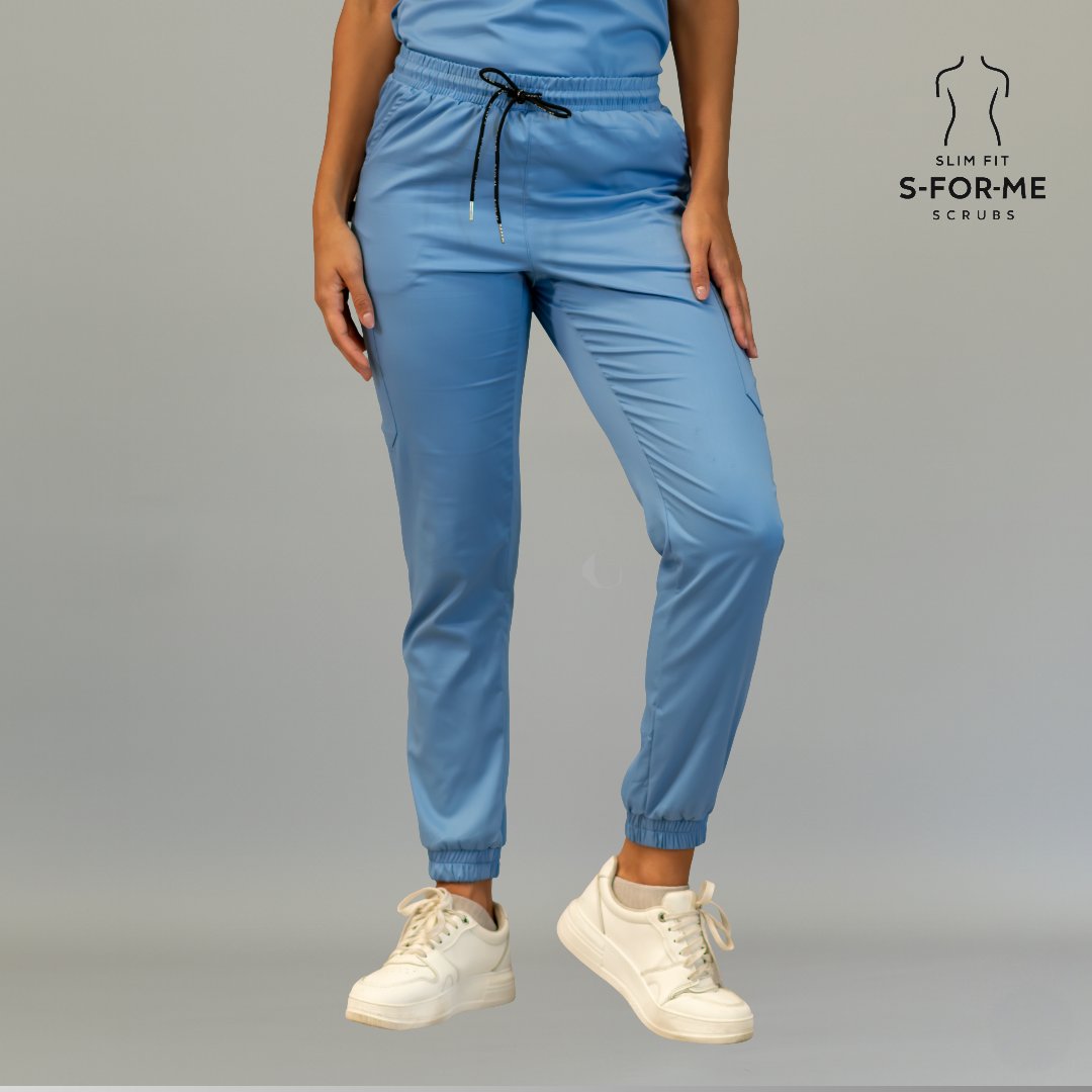 Front view of women’s ceil blue scrub jogger pants with drawstring waist and ankle cuffs