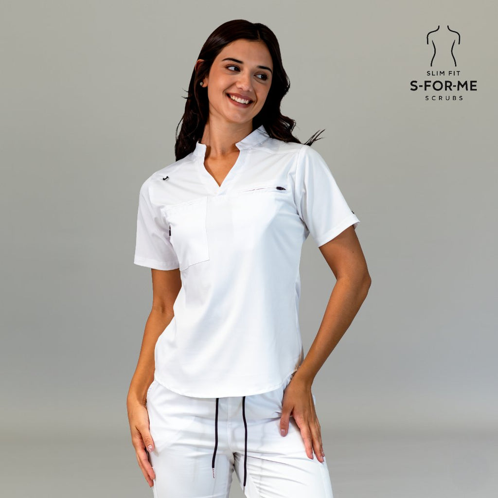 Women’s white 4-way stretch scrub top with matching scrub pants