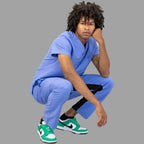 pantalon 500 azul plumbago antifluido espalda unisex sandel medica
