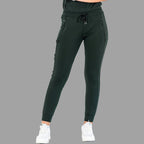 Front view of women's scrub joggers 920 super stretch bottle green with drawstring waist.