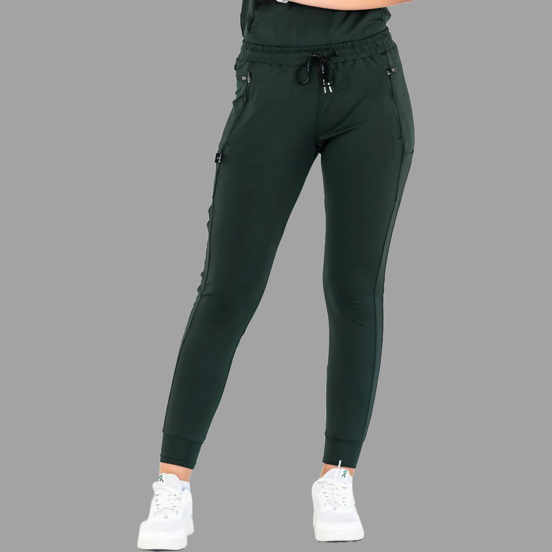 Front view of women's scrub joggers 920 super stretch bottle green with drawstring waist.