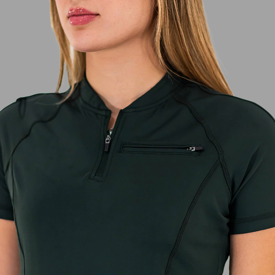 Close up detail of the zipper on the bottle green 920 super stretch scrub top.