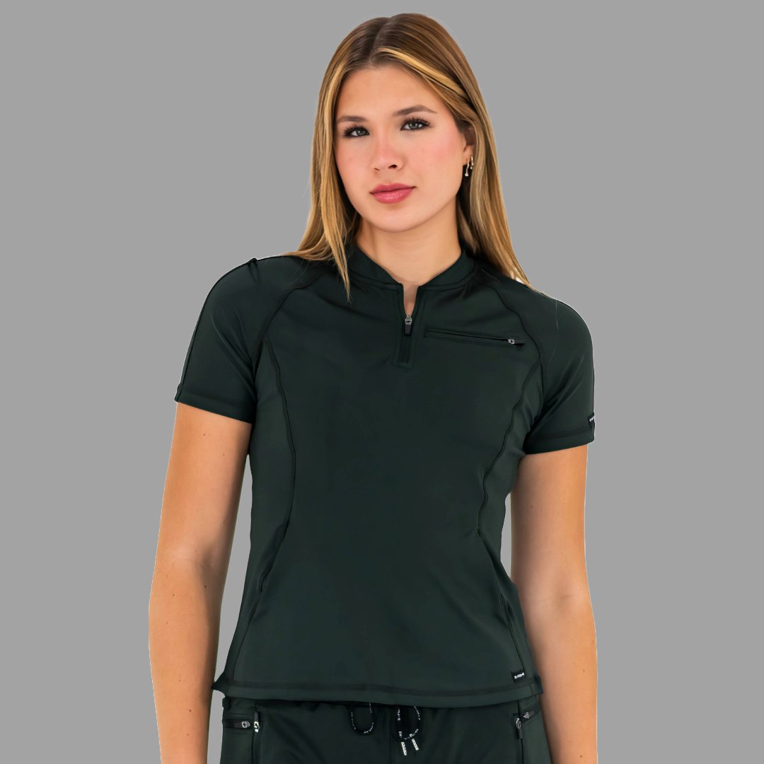 Woman standing straight facing slightly right in a bottle green 920 super stretch scrub top.