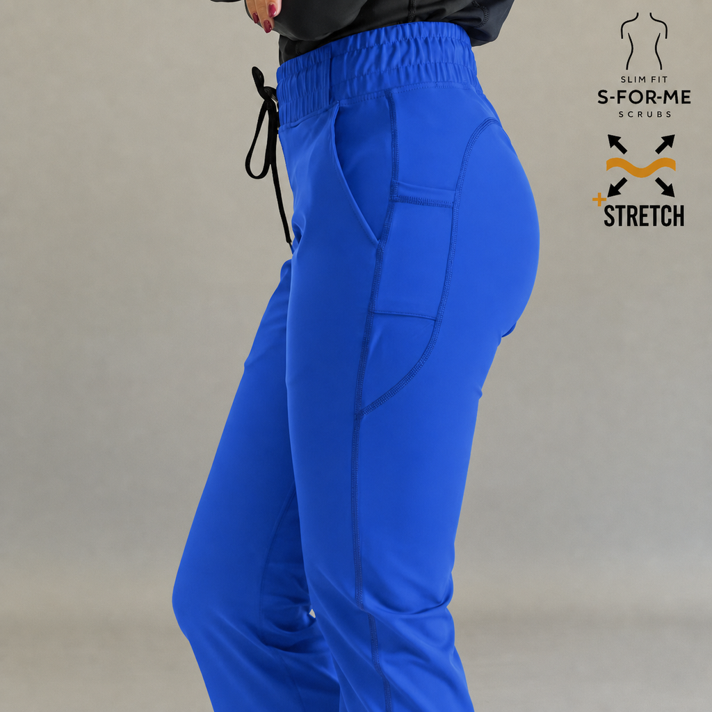 Pantalón scrub flare 915 Azul Rey — detalle bolsillo lateral y bota acampanada